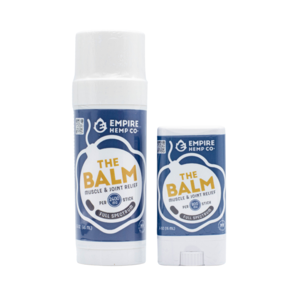 Two containers of Empire Hemp Co. The Balm CBD Topical on a clear background