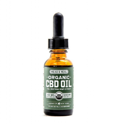 A 30ml bottle of CBD oil from Head and Heal, on a white background.