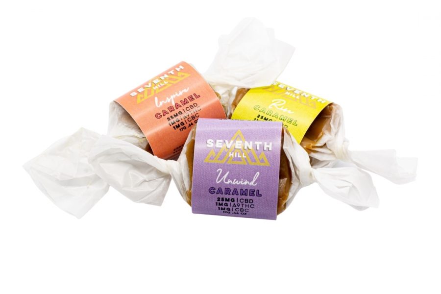 Three assorted flavors of Seventh Hill's CBD Caramels on a white background.