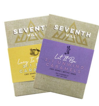 Two boxes of Seventh Hill 6 pack 2:1 caramels on a clear background