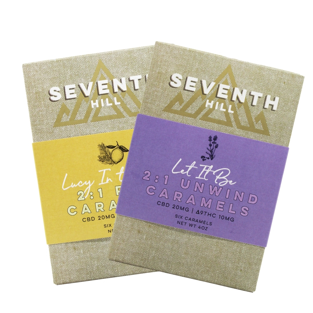 Two boxes of Seventh Hill 6 pack 2:1 caramels on a clear background
