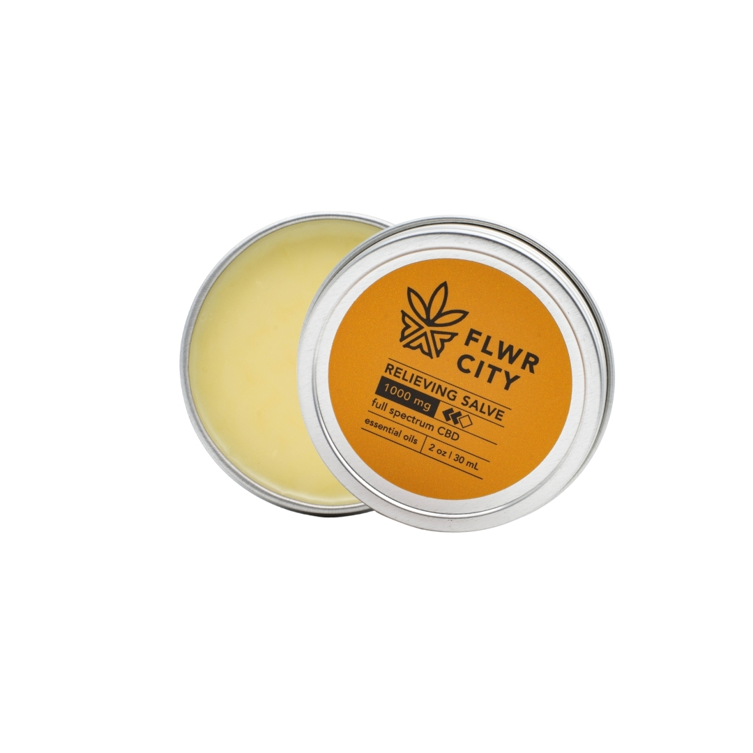 An open tin of FLWR CITY CBD Relieving Salve on a white background