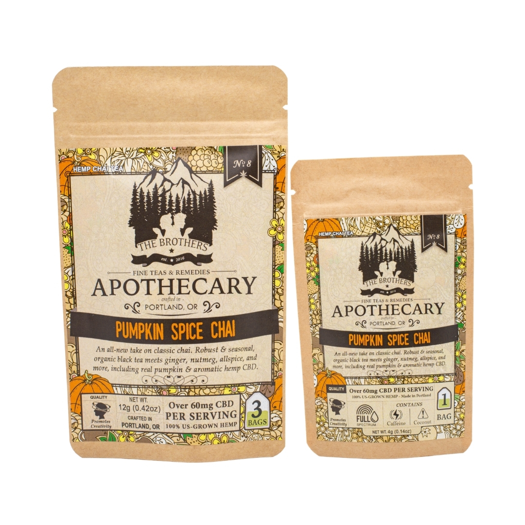 Two packets of The Brothers Apothecary's Pumpkin Spice Chai tea, one large and one small, on a white background