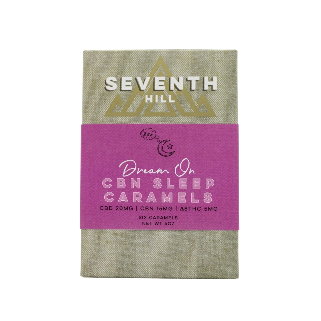 A 6 pack box of Seventh Hill CBD's CBN Sleep Caramels on a clear background