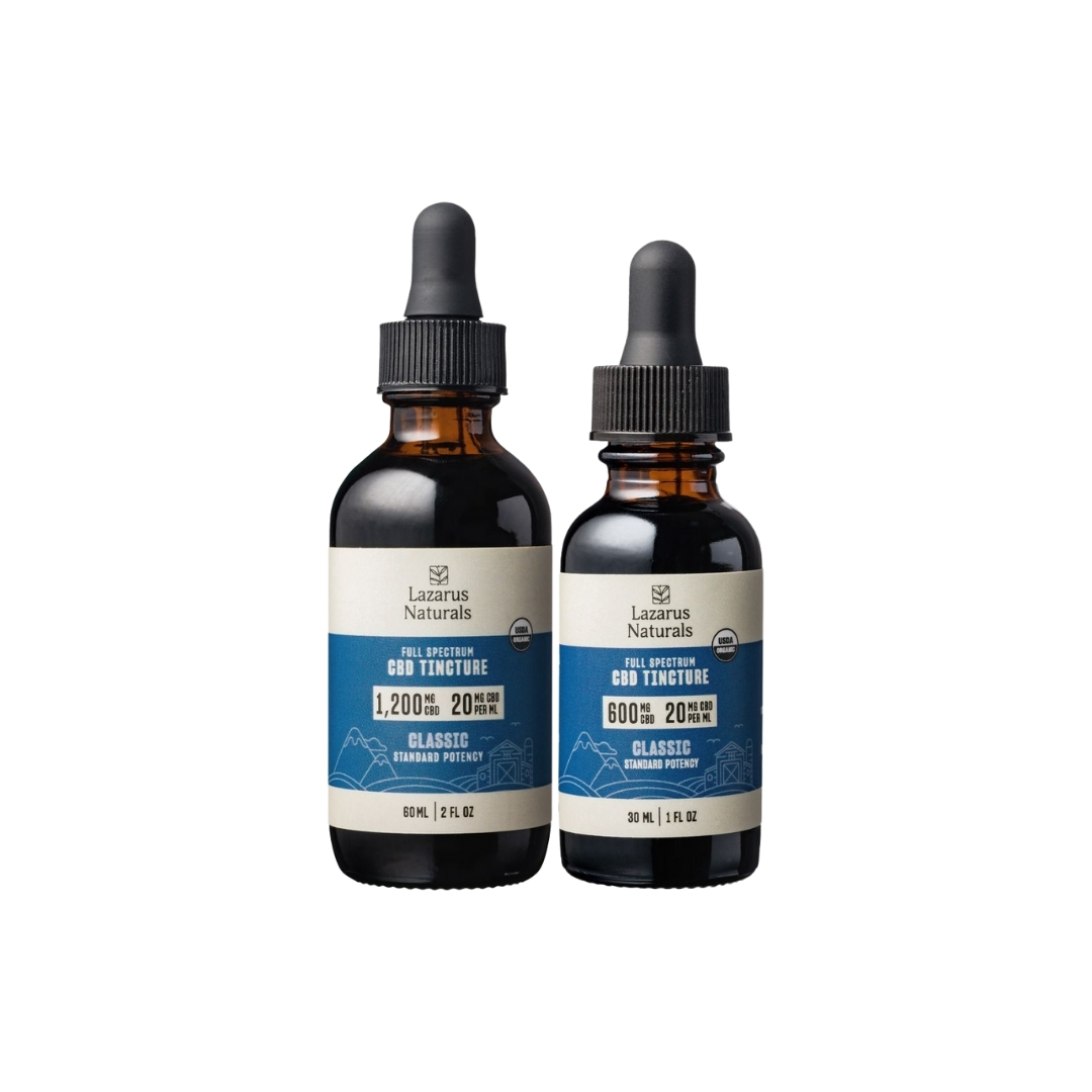 Two tinctures of Lazarus Naturals standard potency CBD oil on a clear background