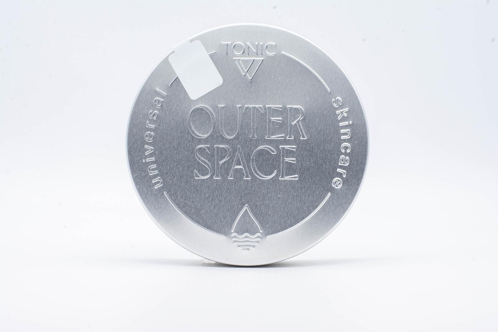 A large can of Tonic's Outer Space CBD + CBG body butter, on a white background