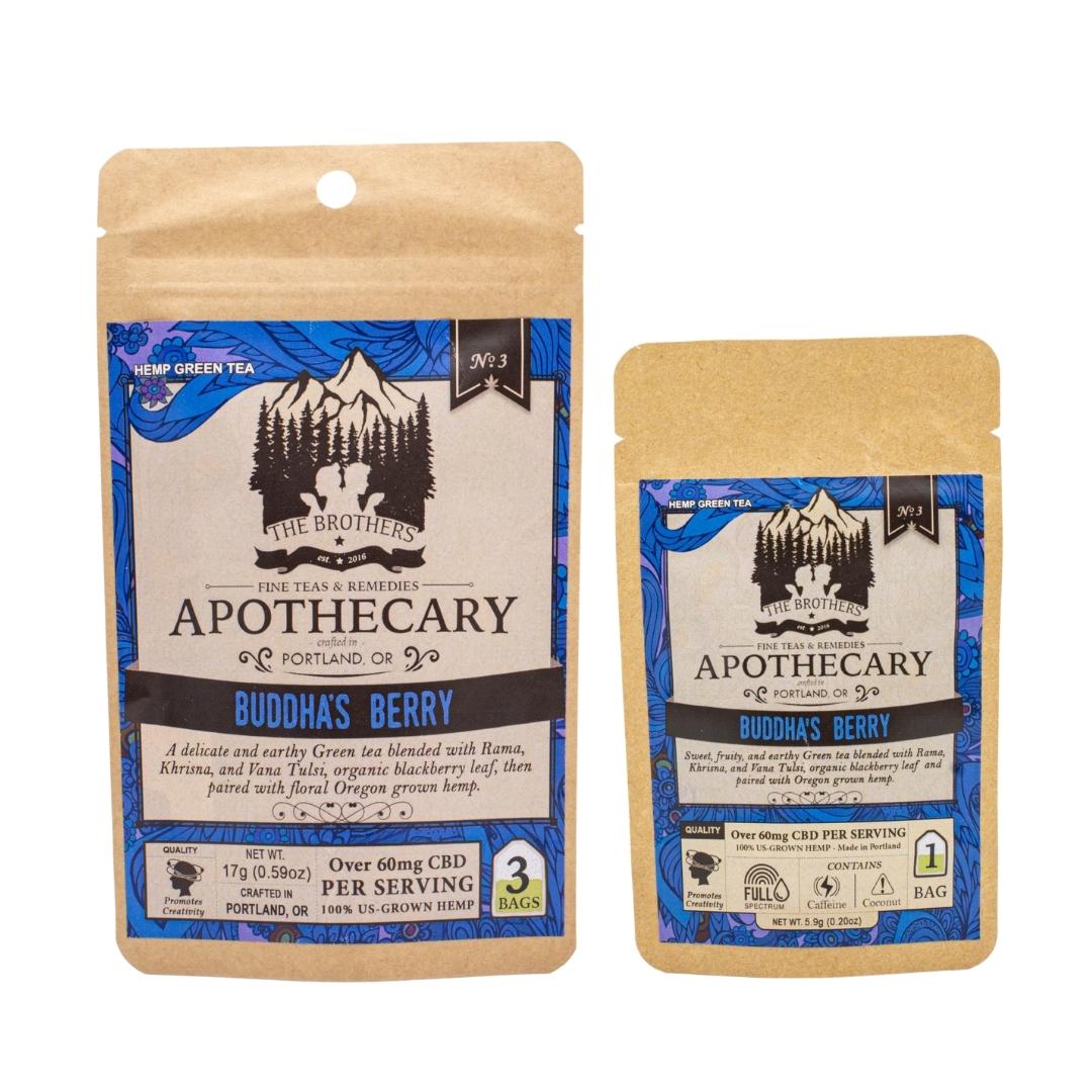 Two packets of The Brothers Apothecary's Buddha's Berry tea, one large and one small, on a white background