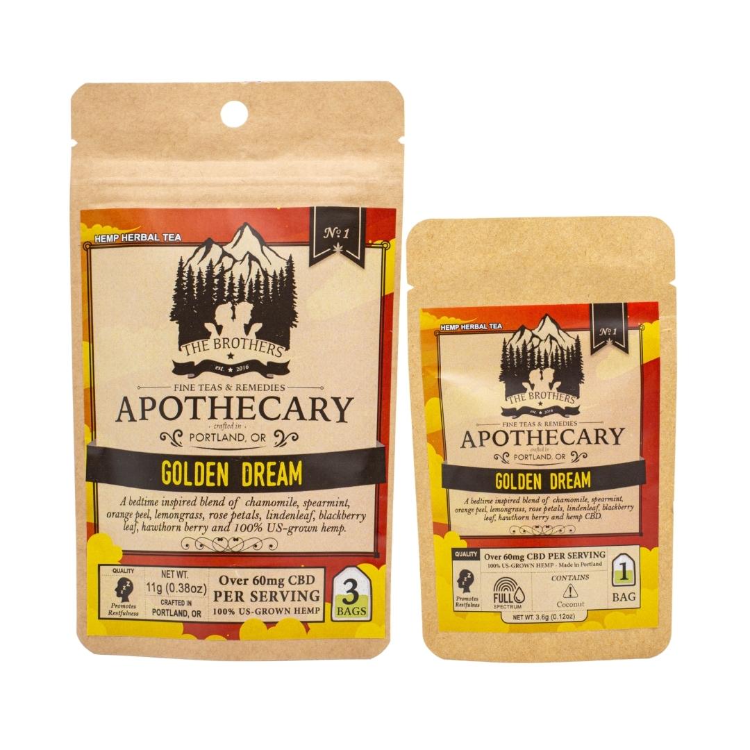 Two packets of The Brothers Apothecary's Golden Dream tea, one large and one small, on a white background