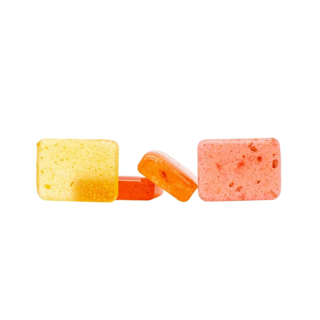 The four flavors of Nice CBD hard candies, on a white background