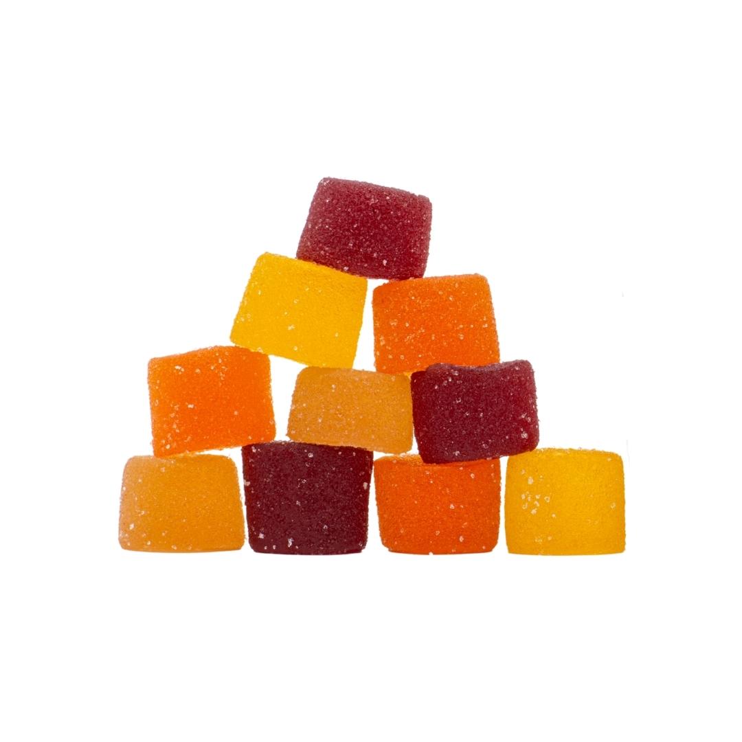 A stack of XITE 5:1 Delta-9 Fruit Gummies on a clear background