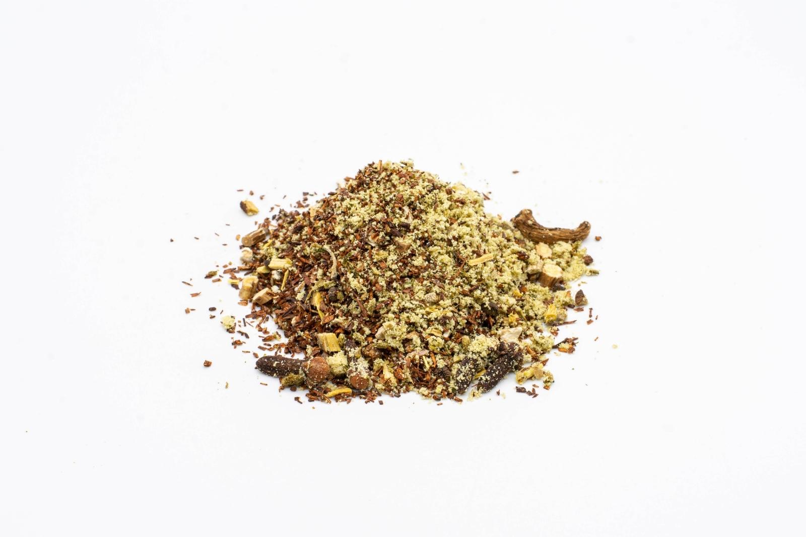 A pile of loose Cosmic Cleanse Tea by The Brothers Apothecary on a white background