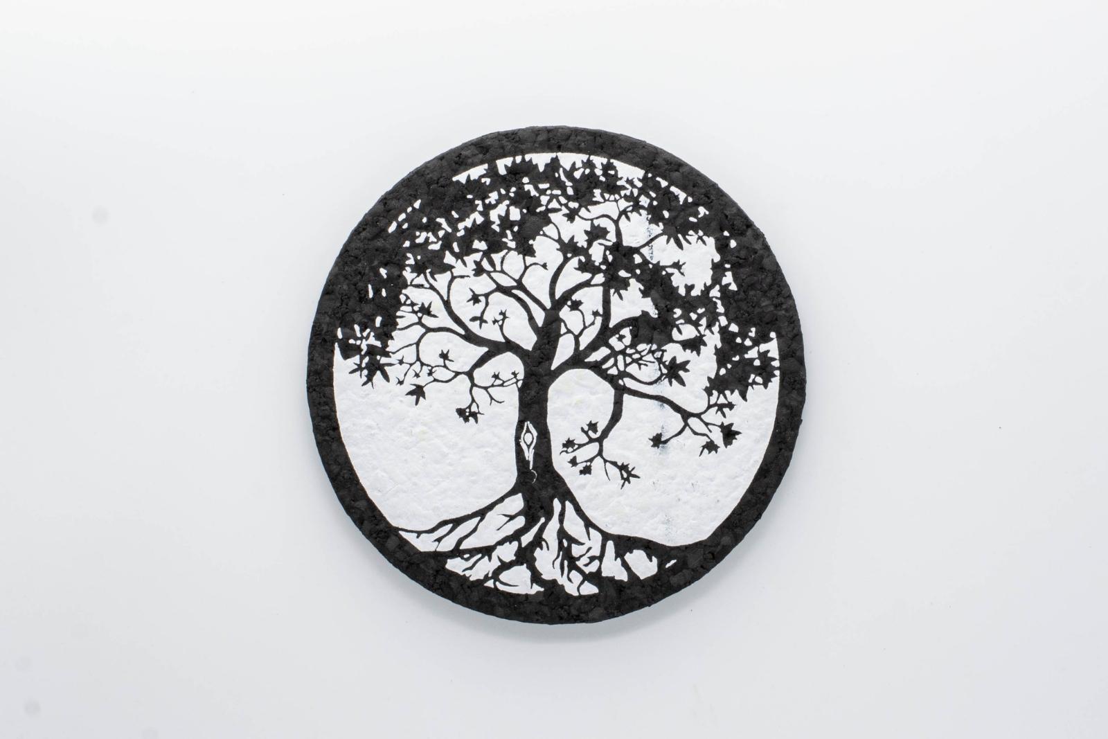 A white Tree of Life rubber dab mat from East Coasters, on a white background