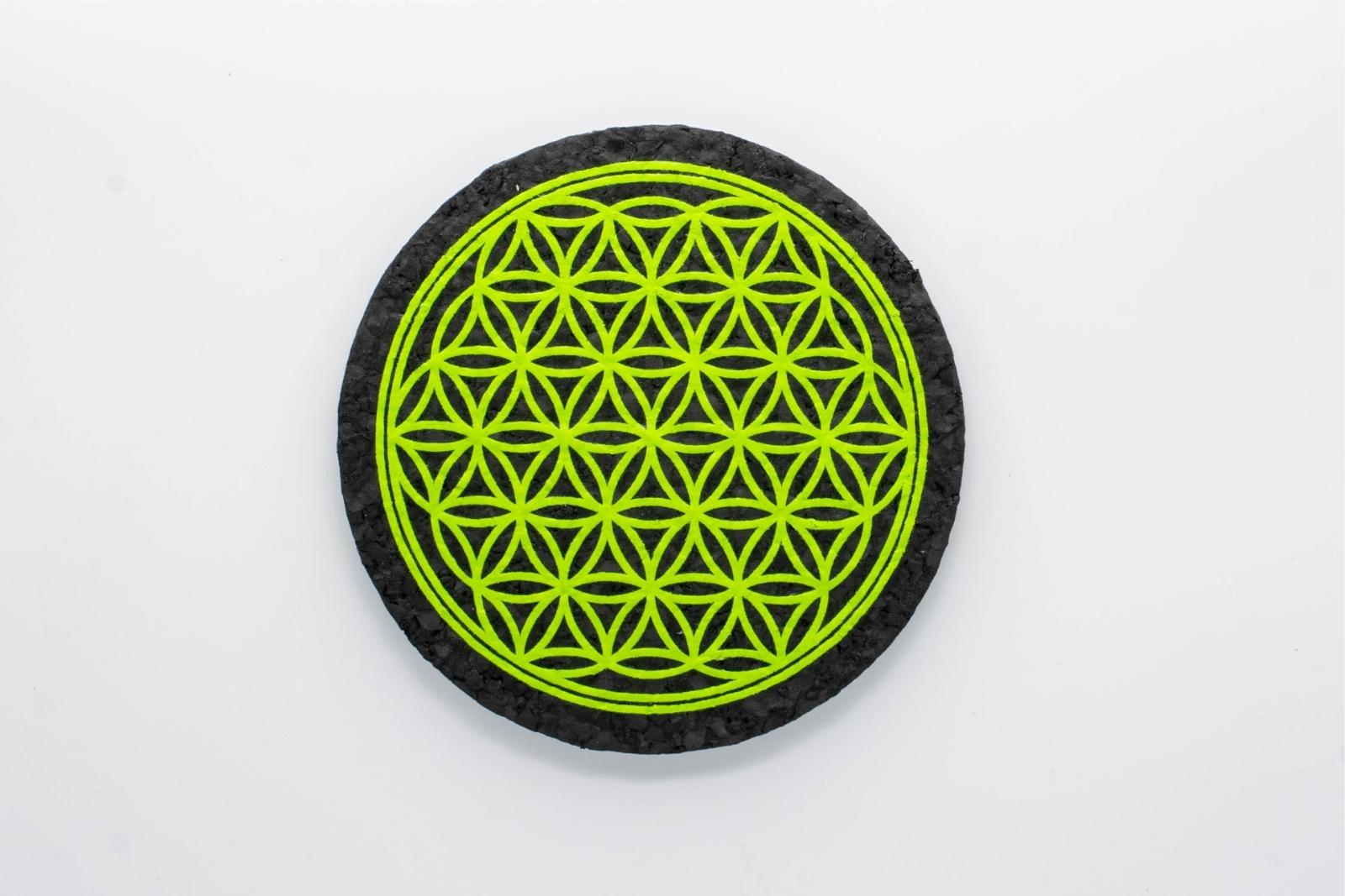 A green Flower of Life rubber dab mat from East Coasters, on a white background