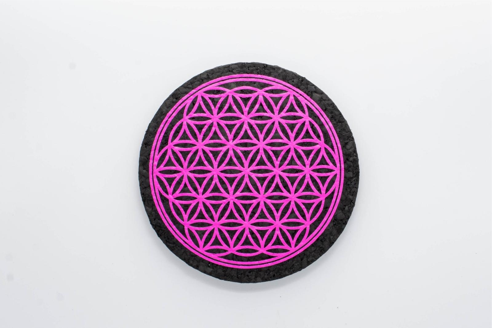 A pink Flower of Life rubber dab mat from East Coasters, on a white background