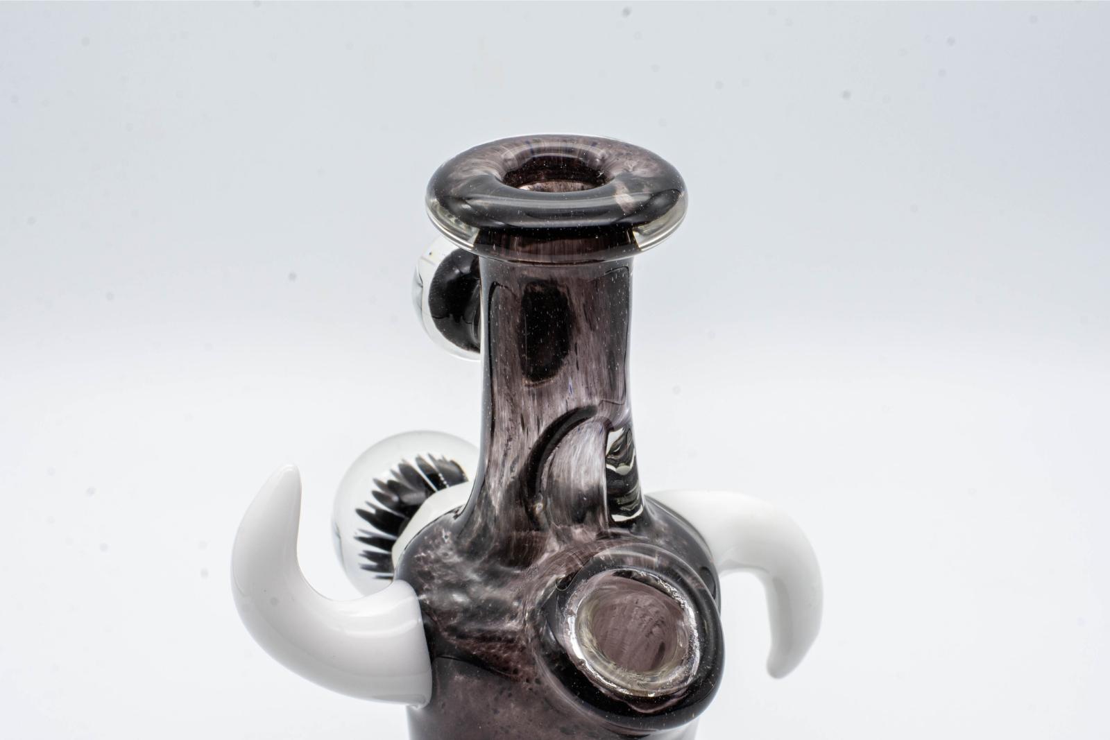 A black and white, 6-inch jammer, made by GooMan Glass, on a white background