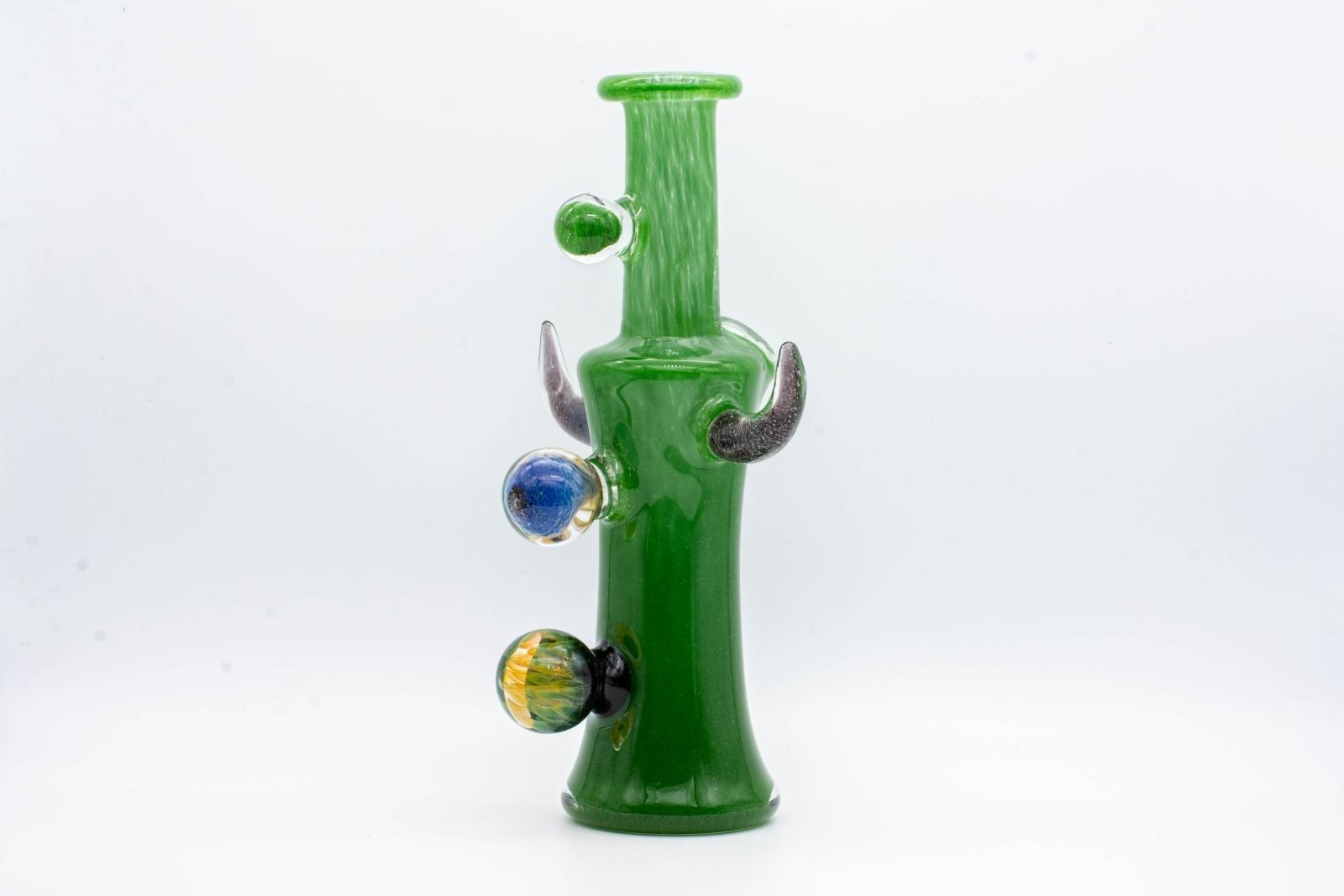 A green, 8-inch jammer, made by GooMan Glass, on a white background