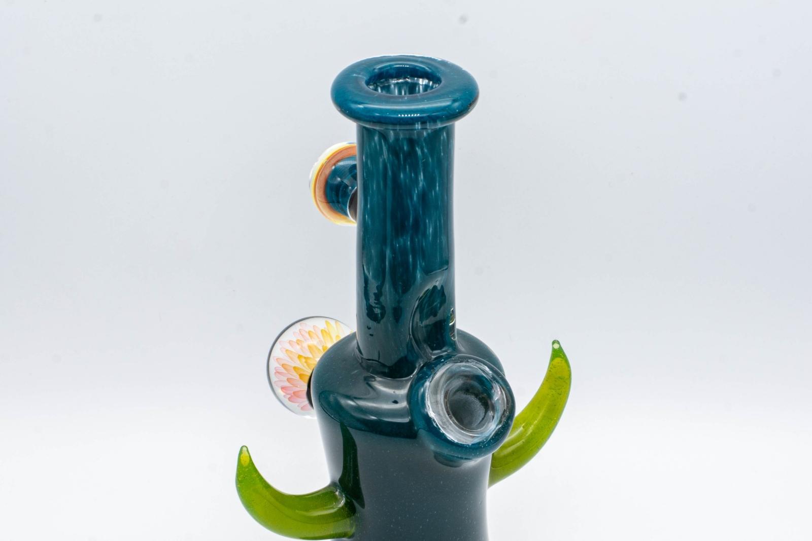 A dark blue, 7-inch jammer, made by GooMan Glass, on a white background