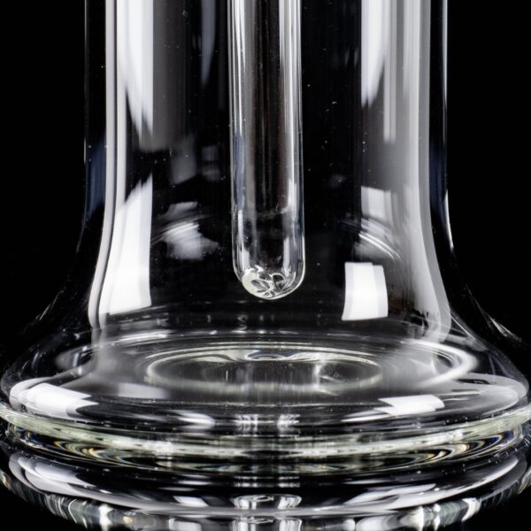 A clear 6-inch minitube made by BorOregon, on a black background