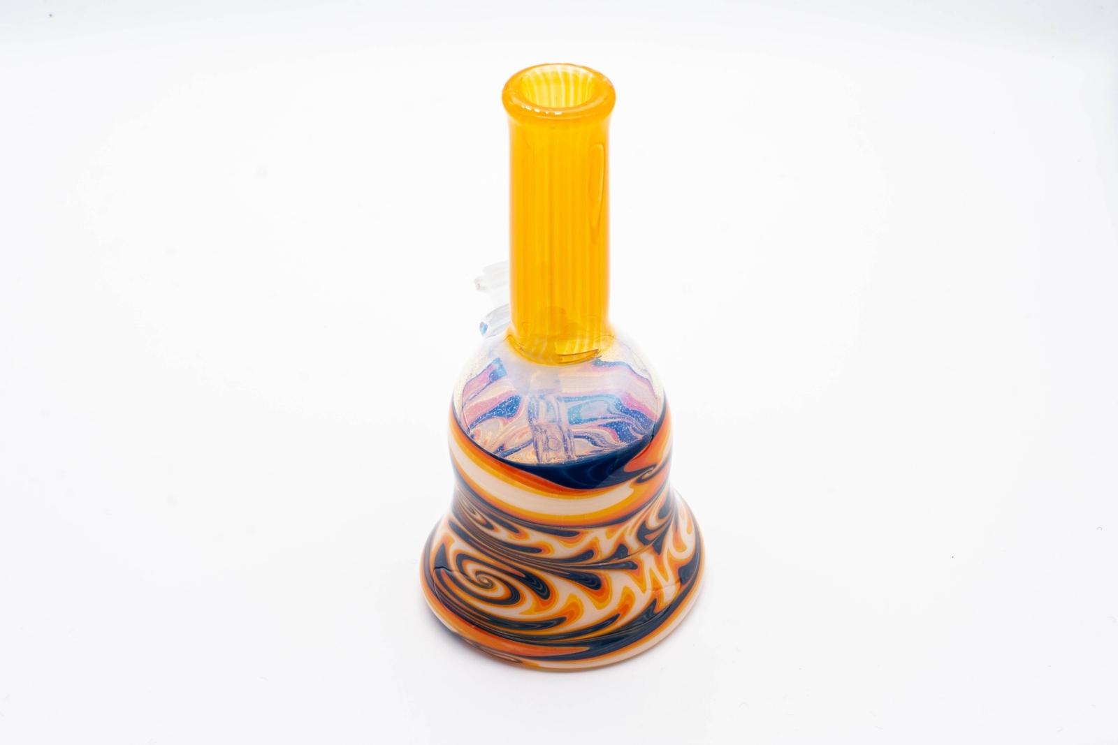 A tangie 6-inch glass rig, made by Bradfurd Glass, on a white background
