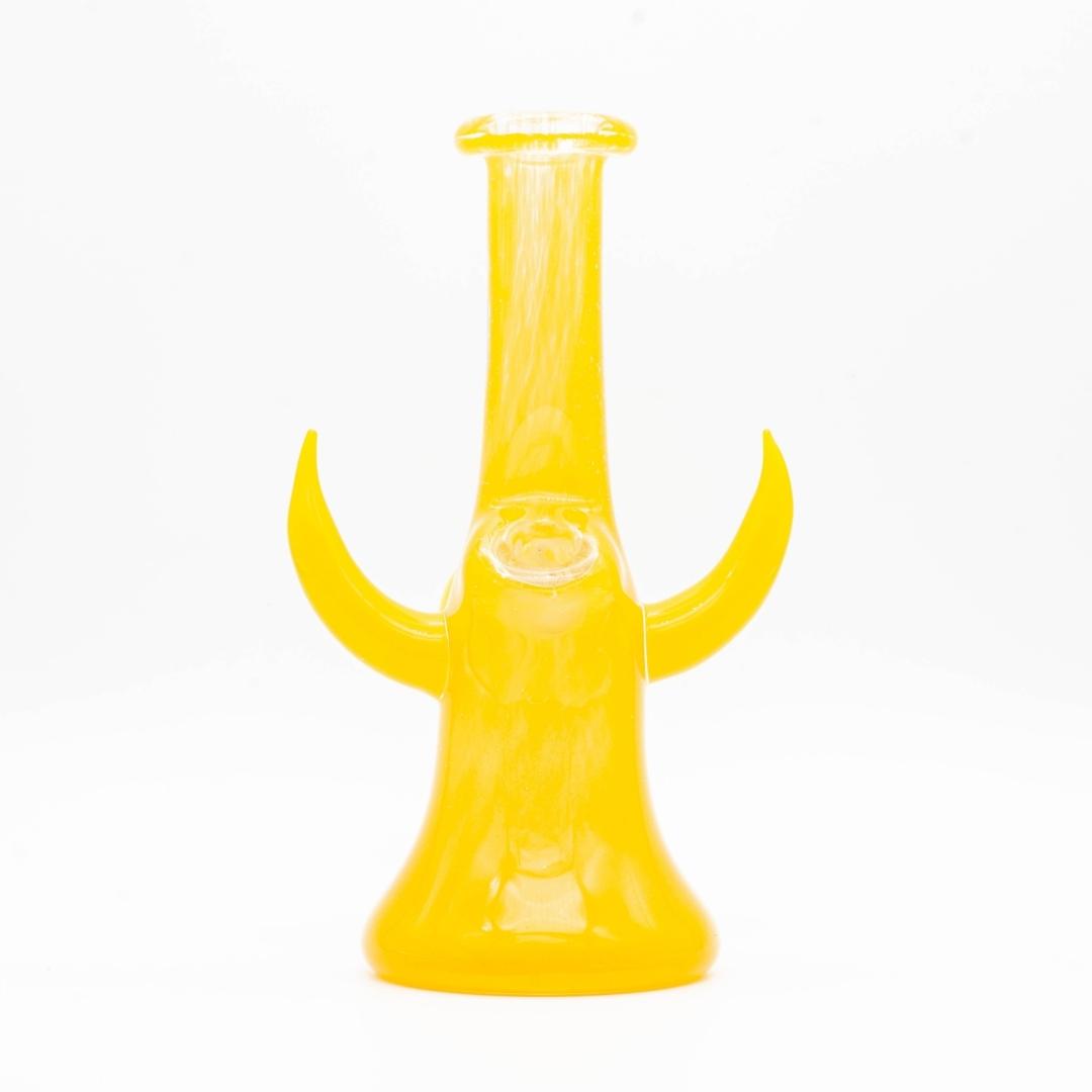 A yellow, 6-inch jammer, made by GooMan Glass, on a white background