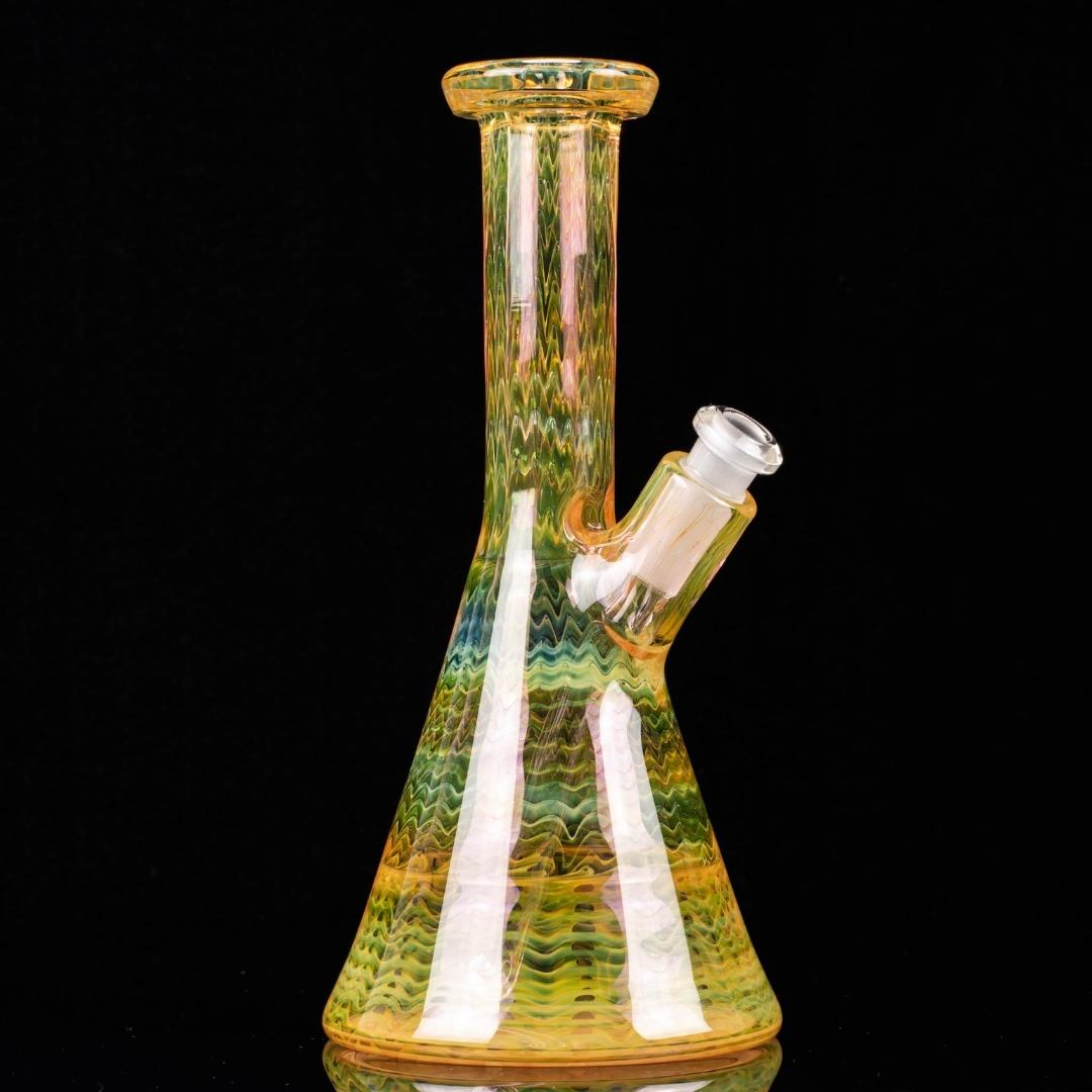 A fully fumed, 8-inch minitube, made by BorOregon, on a black background