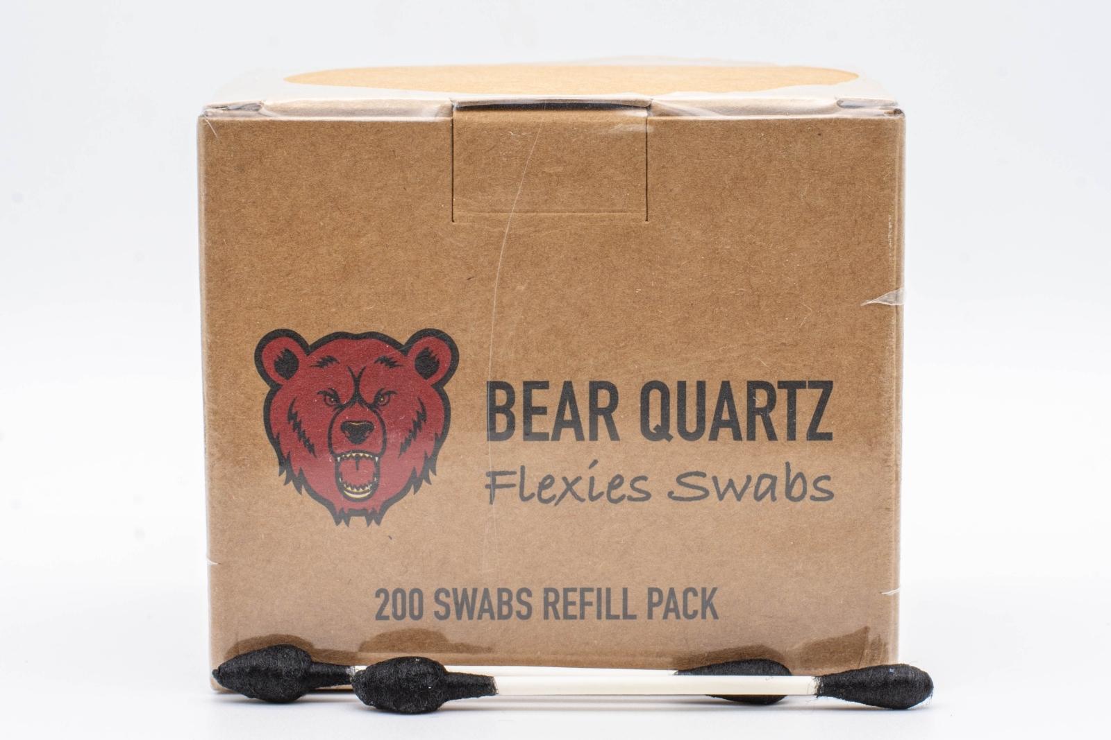 A BQ Flexies Refill box, with two cotton swabs laid out in front of the box, on a white background