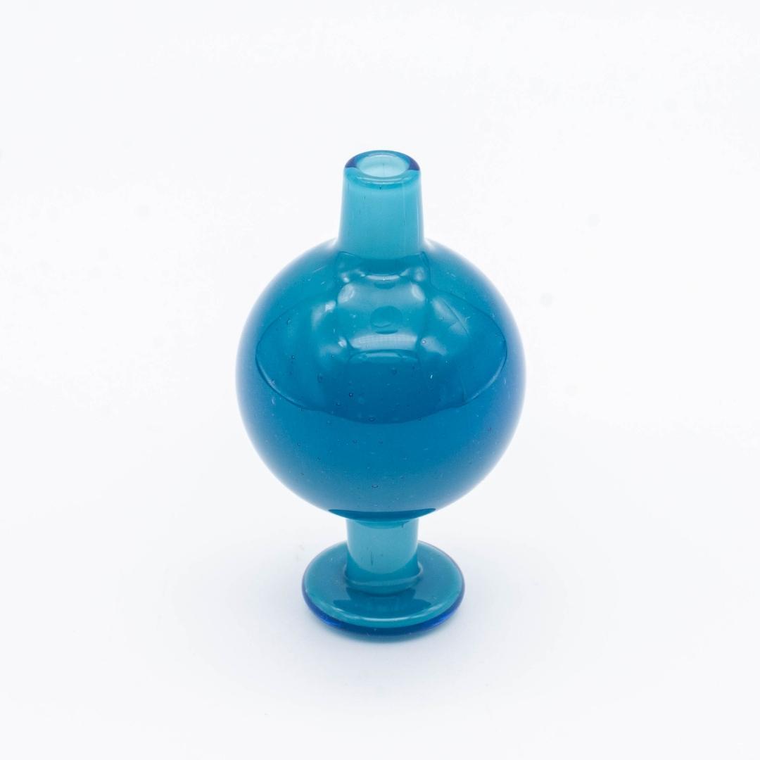 A blue bubble cap made by BorOregon, on a white background