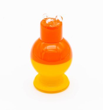 A red and yellow spinner bubble cap made by BorOregon, on a white background