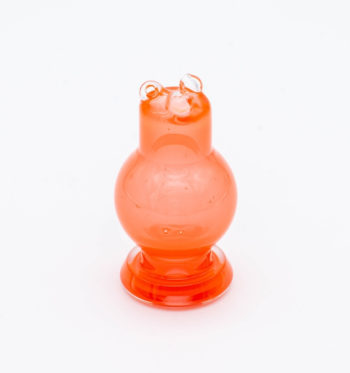 A red spinner bubble cap made by BorOregon, on a white background