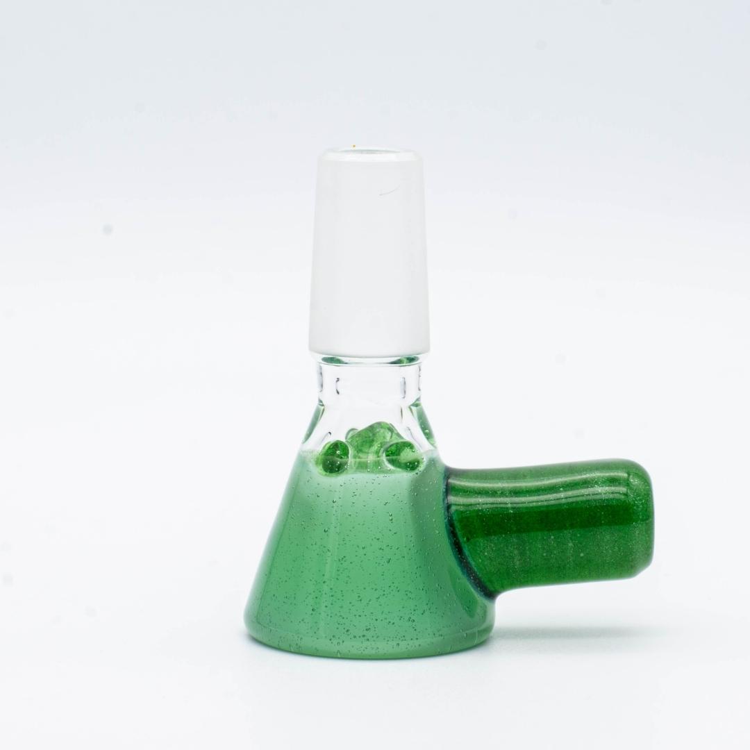 A 14mm green slide made by BorOregon, on a white background