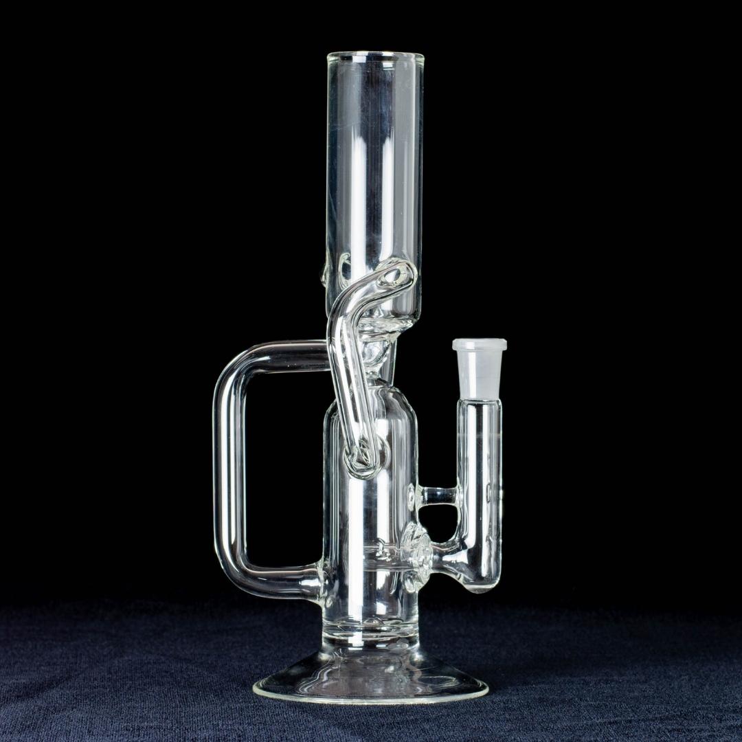 A clear, 10-inch tube cycler, made by Jack Glass Co., on a black background