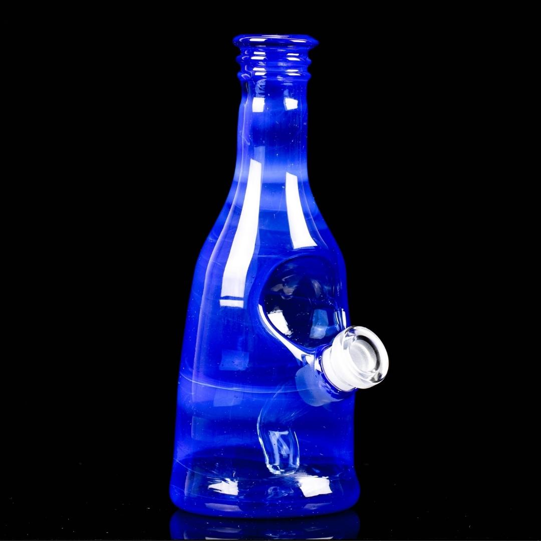 A blue sake bottle rig by Costa Glass, on a black background
