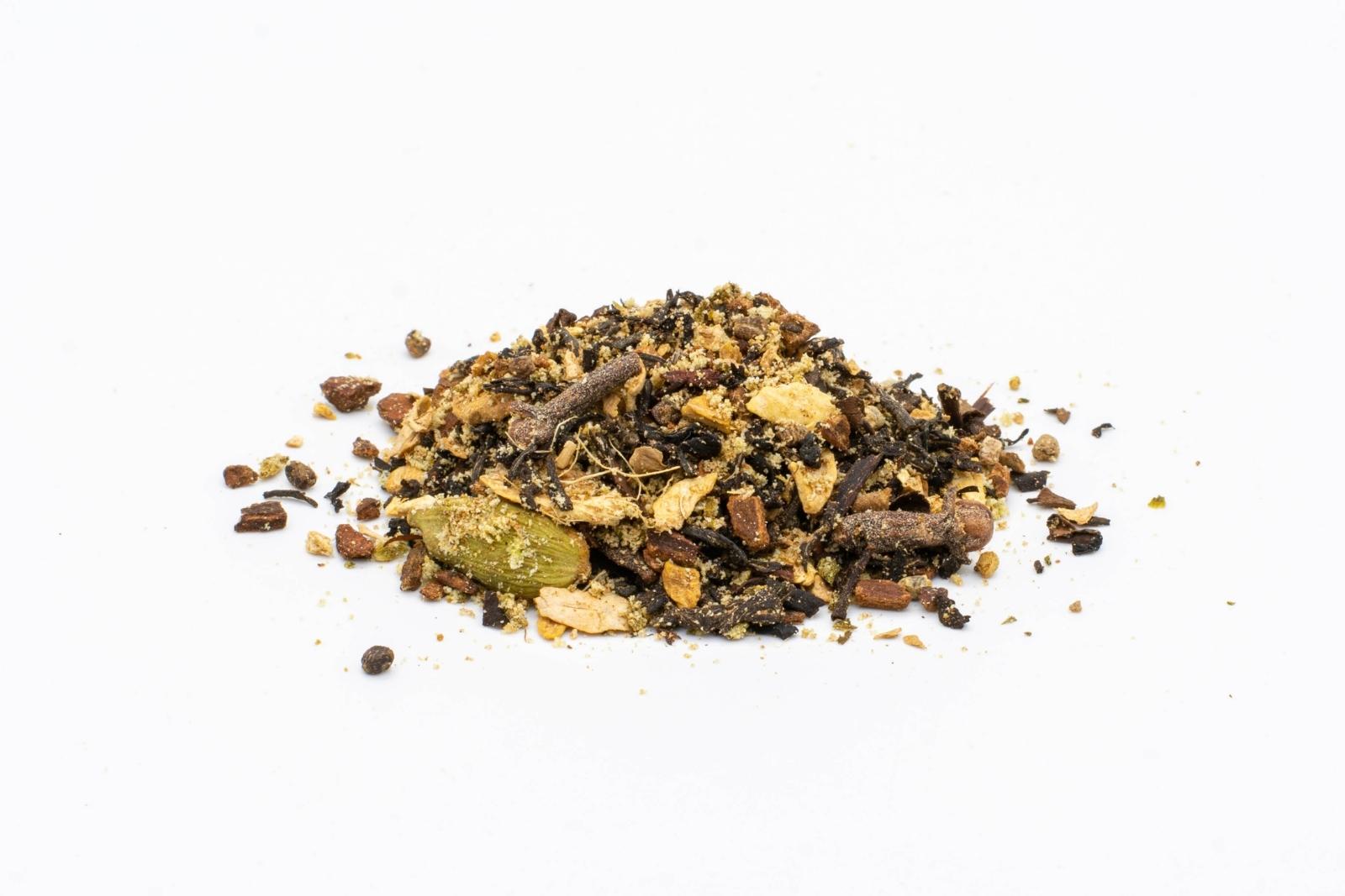 A pile of loose Chai Awakening CBD Tea by The Brothers Apothecary on a white background