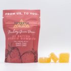 A bag of 3:1 Sativa Hybrid Gummies by Seventh Hill CBD, next to a pile of the gummies, on a white background