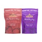 One bag of 3:1 Sativa Hybrid Gummies and one bag of Indica Gummies by Seventh Hill CBD, on a clear background