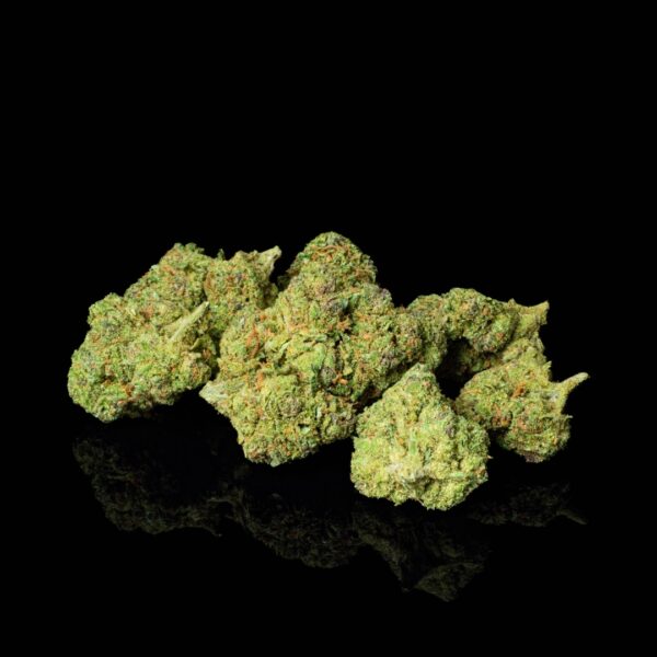 A pile of nugs of Pink Panther hemp flower on a black background.