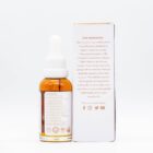 A tincture of Extract Labs 1:1 Cognitive Support CBG Oil, next to its box, on a white background