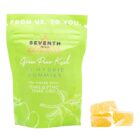 A bag of 3:1 Indica Gummies by Seventh Hill CBD, next to a pile of the gummies, on a white background