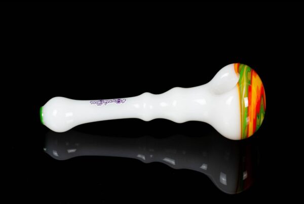 A side shot of Sqwash Glass Wig Wag Spoon A on a black background