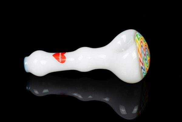 A side shot of Sqwash Glass Wig Wag Spoon B on a black background