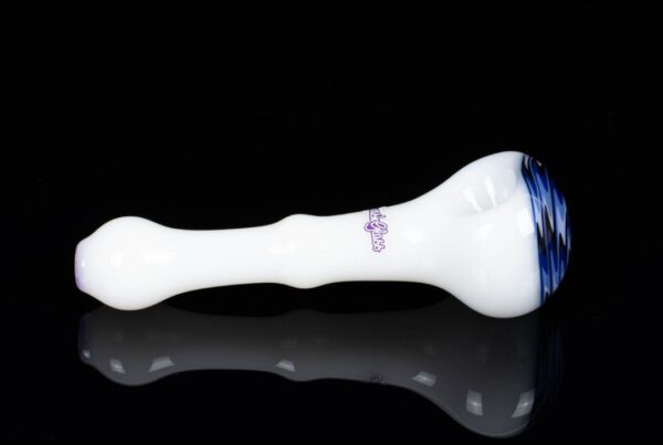 A side shot of Sqwash Glass Wig Wag Spoon C on a black background