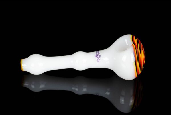 A side shot of Sqwash Glass Wig Wag Spoon D on a black background