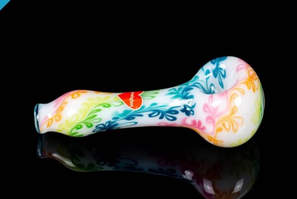 A side shot of Sqwash Glass Rainbow Vine Spoon A on a black background
