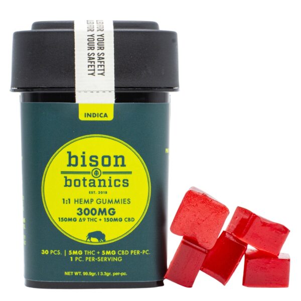 A 30-count container of Bison Botanics 1:1 Indica Gummies, next to a pile of the gummies, on a clear background