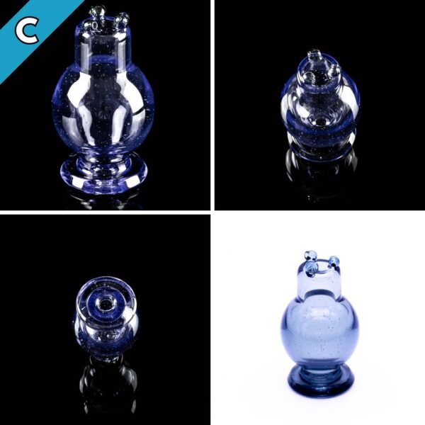 A blue spinner bubble cap, made by BorOregon, on a black background