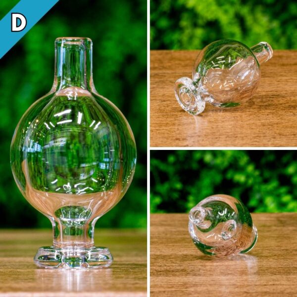 A clear bubble cap, made by BorOregon, on a wood surface