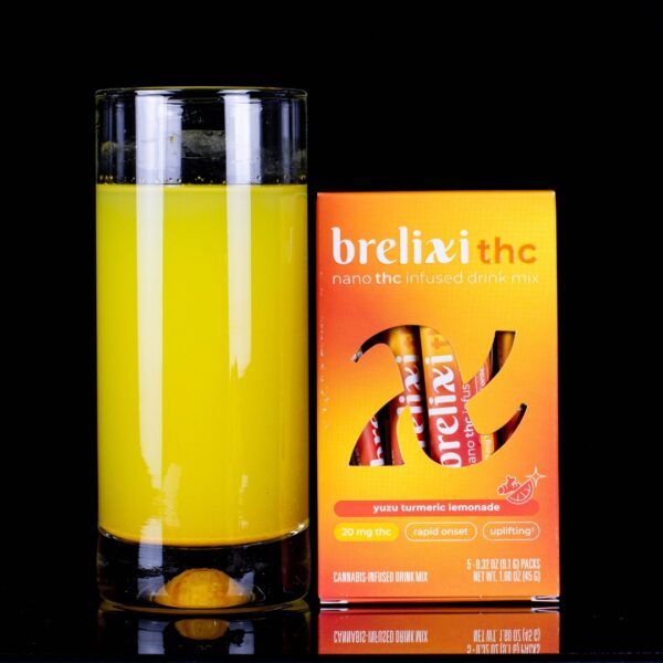 A 5-pack of Brelixi Nano THC Infused Drink Mix, next to a drinking glass containing a mixture of water and the mix, on a black background.
