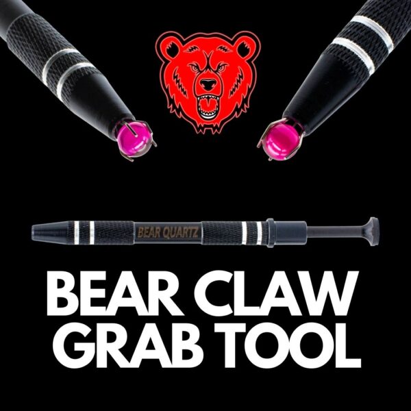A Bear Quartz Bear Claw Grab Tool, holding a ruby terp pearl, on a black background