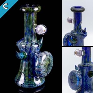 Three photos of a cobalt fumed jammer by Gooman Glass, on a white background and a black background