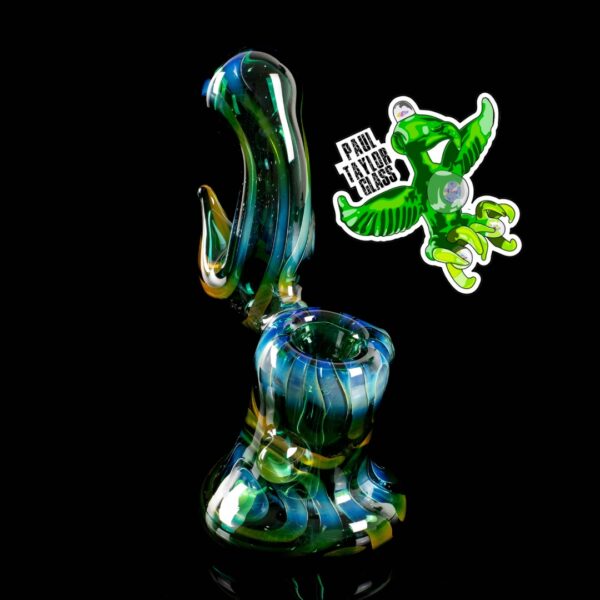 A Paul Taylor Glass Fumed Over Color Bubbler, on a black background